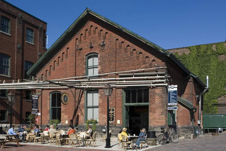Balzac's in Toronto's Distillery District. The coffee roaster transformed a circa 1895 Pump House into a two-storey Grand Parisian style café.
