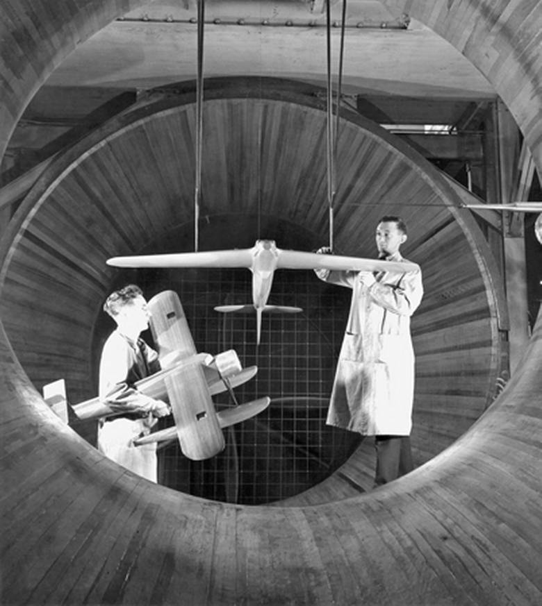 Scientist study aerodynamics in the NRC’s first wind tunnel, built before the Second World War. NATIONAL RESEARCH COUNCIL OF CANADA